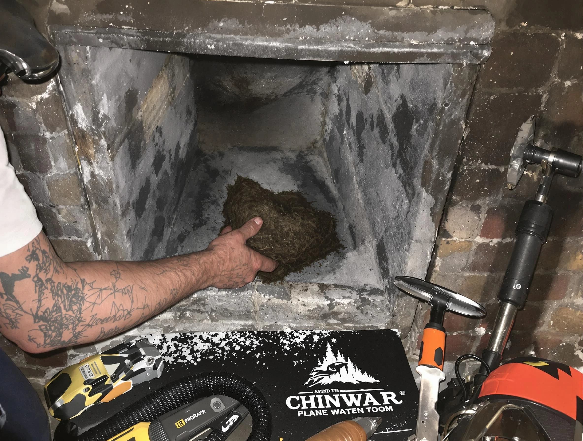 Green Hill Chimney Sweep safely removing debris and screening chimney in Green Hill, TN